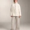 Veste en simili-peaux lainées à taille ajustable Veste en simili-peaux lainées à taille ajustable