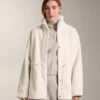 Veste en simili-peaux lainées à taille ajustable Veste en simili-peaux lainées à taille ajustable