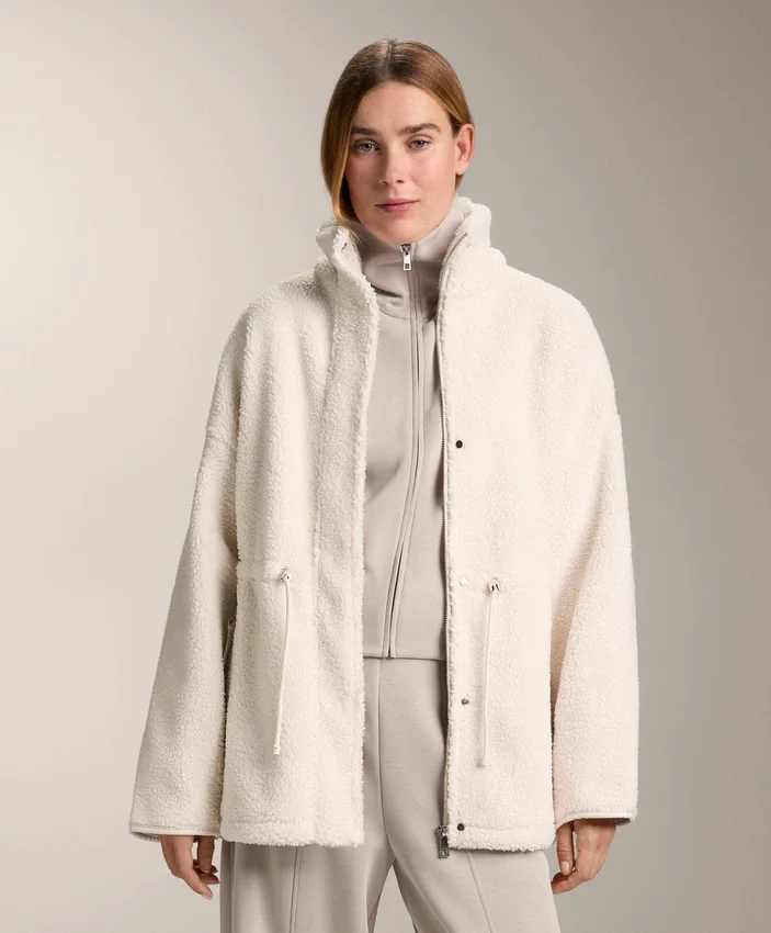 Veste en simili-peaux lainées à taille ajustable Veste en simili-peaux lainées à taille ajustable