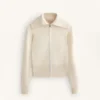 Veste en tricot avec fermeture éclair contrastée Veste en tricot avec fermeture éclair contrastée