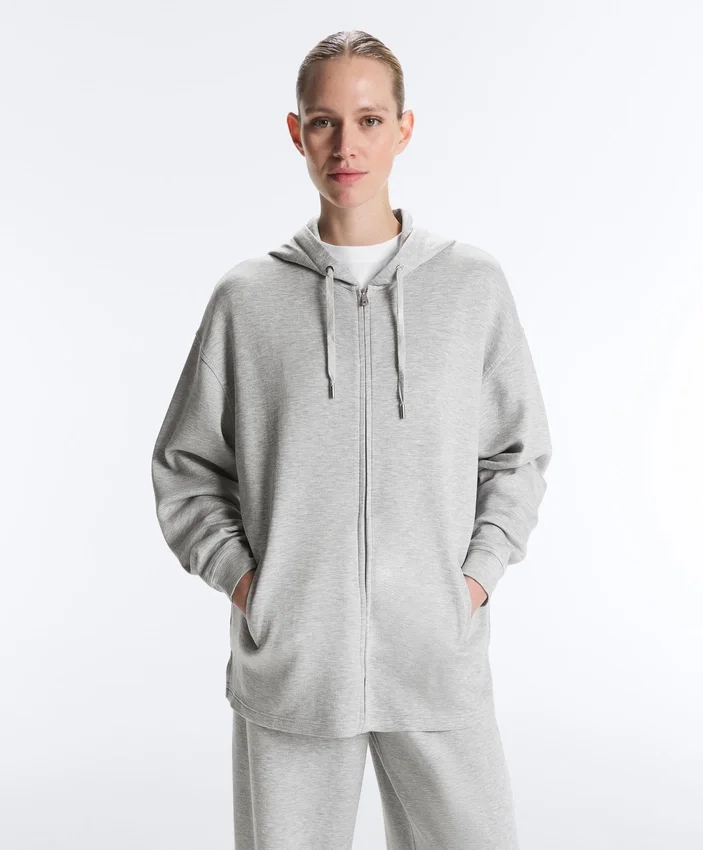 Veste longue à capuche en piqué chiné Veste longue à capuche en piqué chiné