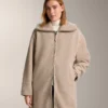Veste longue en imitation peaux lainées