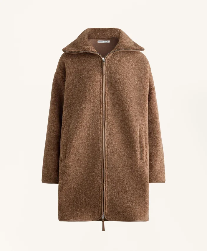 Veste longue en imitation peaux lainées Veste longue en imitation peaux lainées