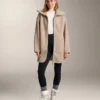 Veste longue en imitation peaux lainées