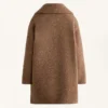 Veste longue en imitation peaux lainées Veste longue en imitation peaux lainées