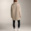 Veste longue en imitation peaux lainées
