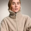 Veste longue en imitation peaux lainées