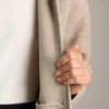 Veste longue en imitation peaux lainées