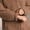 Veste longue en imitation peaux lainées Veste longue en imitation peaux lainées