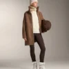 Veste longue en imitation peaux lainées Veste longue en imitation peaux lainées