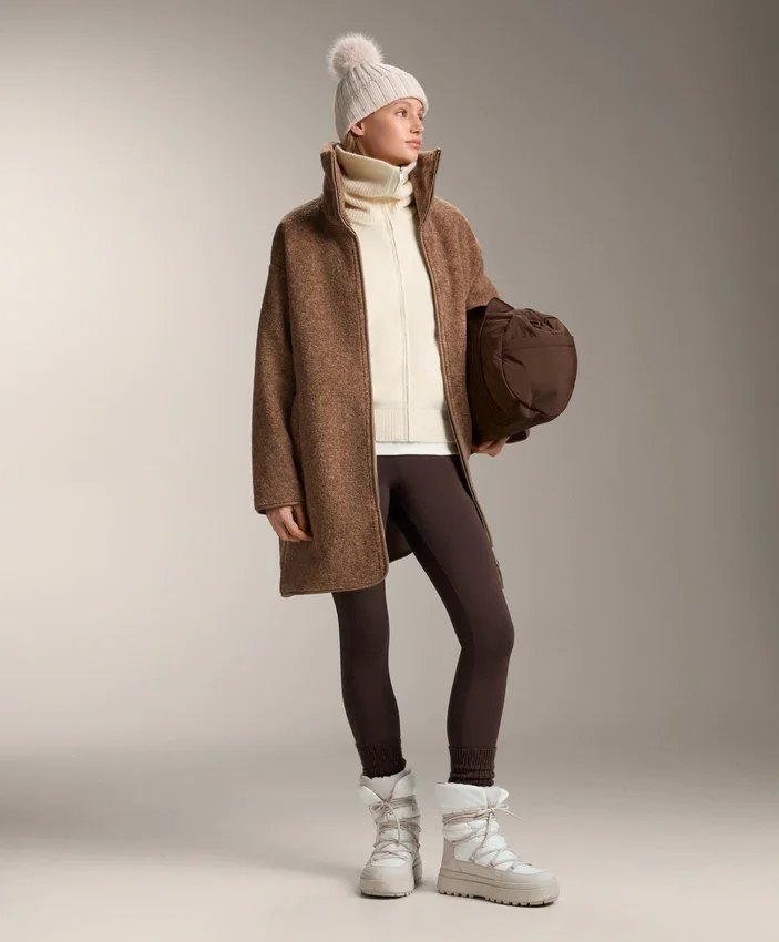 Veste longue en imitation peaux lainées Veste longue en imitation peaux lainées