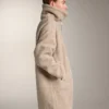 Veste longue en imitation peaux lainées