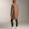 Veste longue en imitation peaux lainées Veste longue en imitation peaux lainées