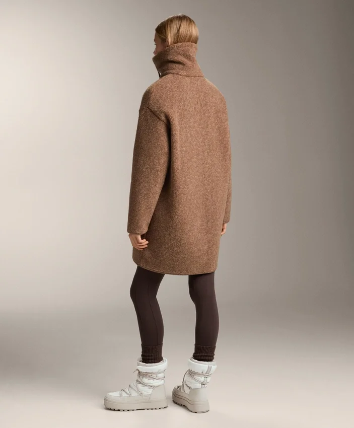 Veste longue en imitation peaux lainées Veste longue en imitation peaux lainées