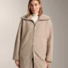 Veste longue en imitation peaux lainées