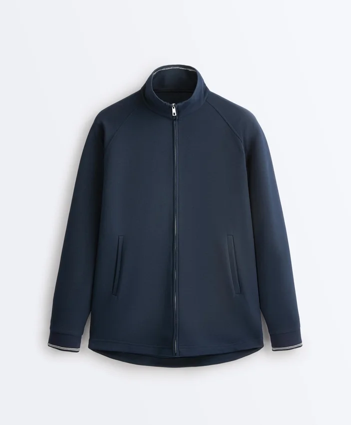 Veste longue en piqué avec passepoil en coton contrasté Veste longue en piqué avec passepoil en coton contrasté