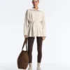 Veste longue en piqué de coton avec ceinture Veste longue en piqué de coton avec ceinture