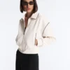 Veste à passepoils effet néoprène Veste à passepoils effet néoprène