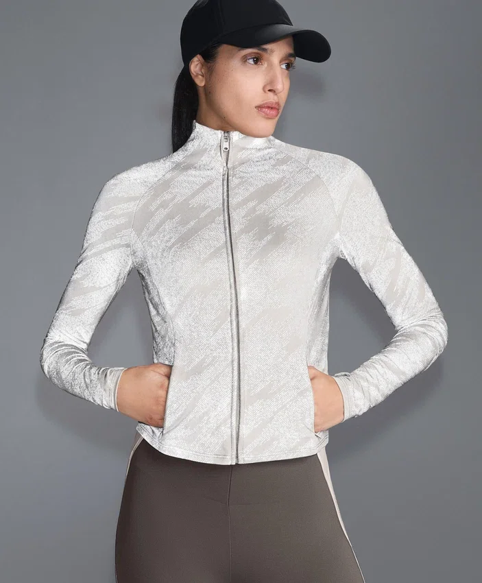 Veste technique légère, chaude et réfléchissante Veste technique légère, chaude et réfléchissante