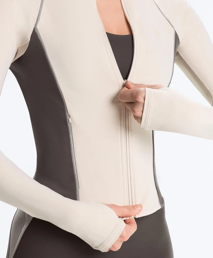 Veste technique légère, chaude et réfléchissante Veste technique légère, chaude et réfléchissante